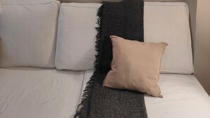 A bedroom with a bed, a wall clock, and a dark throw blanket. - conditioning housing and equipped view roofs central, separate bedroom (Aix-en-Provence)