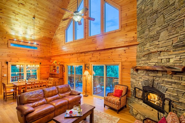 Smart TV, fireplace, books, computer monitors