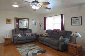 Smart TV, fireplace, DVD player, books