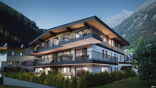 Un immeuble à plusieurs étages, doté de balcons, de grandes fenêtres et surplombant un paysage montagneux.
