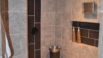 Combined shower/tub, hair dryer, towels, soap