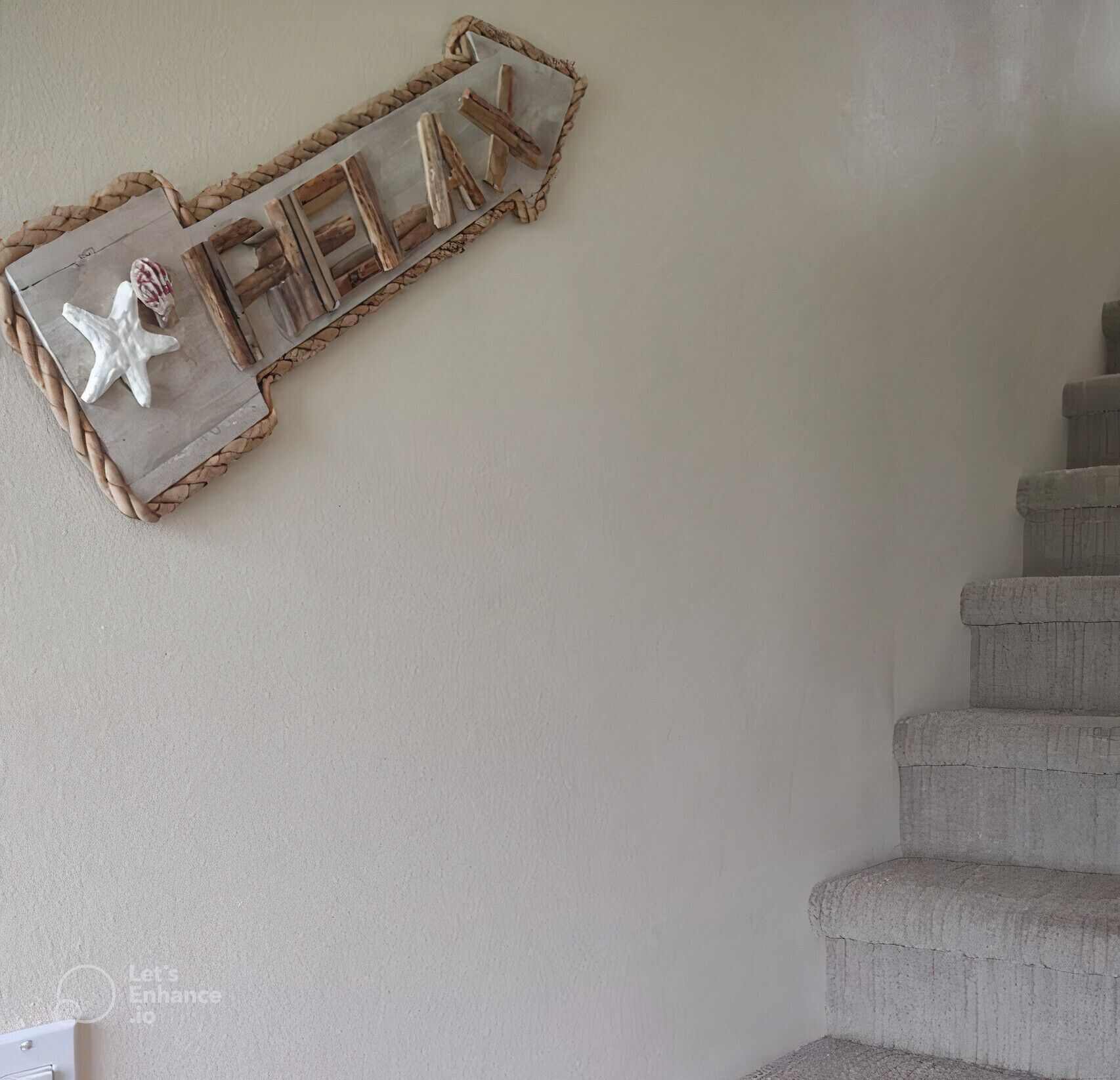 A staircase with a sign that reads "RELAX" and a starfish decoration.