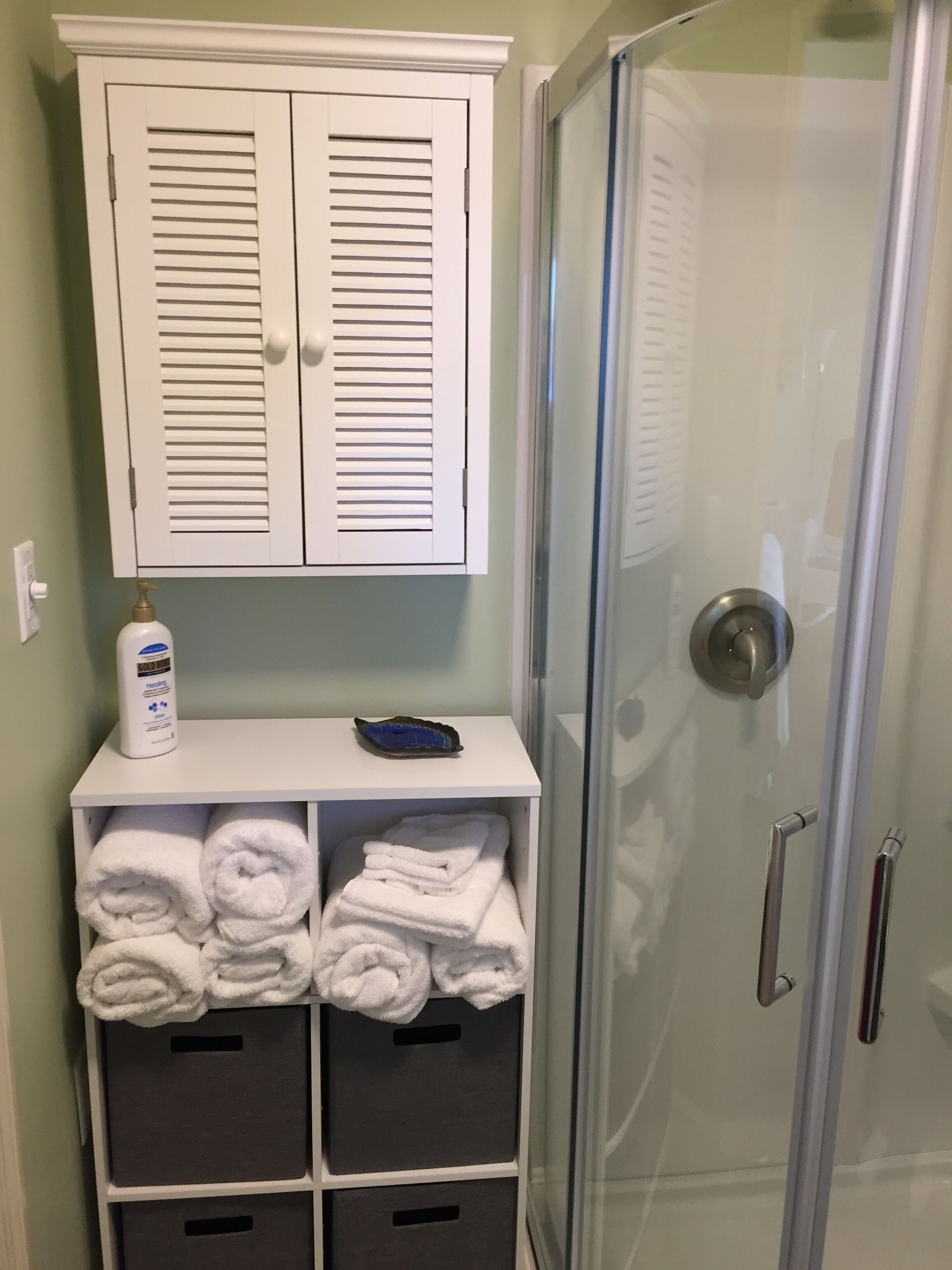 Shower, hair dryer, towels, soap