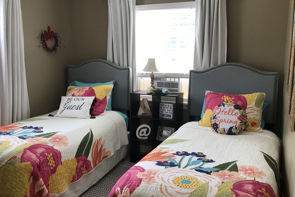 Front bedroom has 2 twin beds. Mattresses have fully sealed covers under linens.