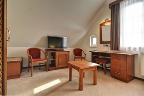 Minibar, desk, bed sheets