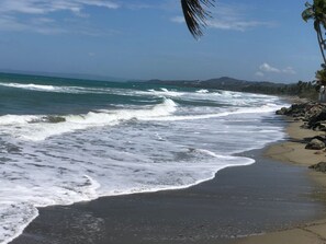 On the beach, sun-loungers, beach towels
