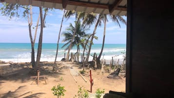 On the beach, sun-loungers, beach towels