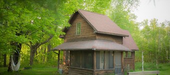 Spiral Staircase Leads To The Lofted Bedroom And Overlooks The Birch Woods.