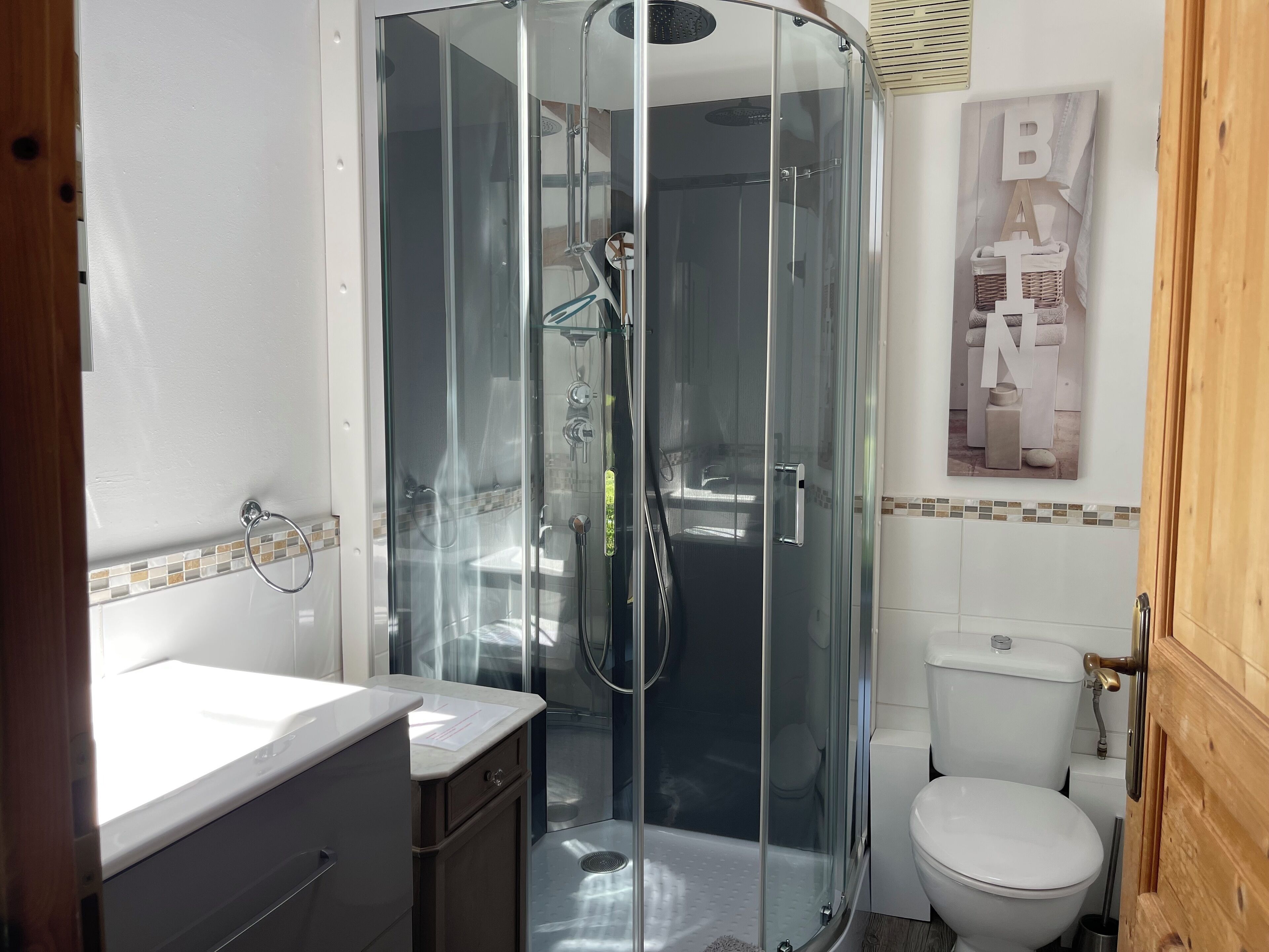 Shower, hair dryer, towels, soap