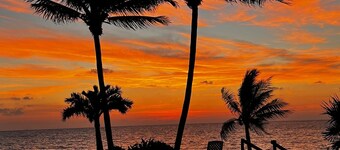 Quiet and serene ocean front 2-bedroom 2-bathroom condo, steps from the sand!