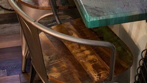 A dining table with a glass top and metal chairs. - Climb On Inn ~Explore Red River Gorge & Comfort ~Perfect Location ~Pet Friendly  (Pine Ridge)