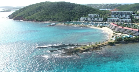 On the beach, sun-loungers, beach towels. Breathtaking Views from Sapphire Village