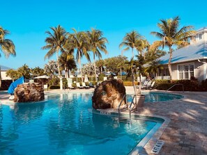 Outdoor pool, a heated pool - Wonderful, spacious 3 bedroom, 2 bath unit, enjoy free Golfing this Summer (Naples)