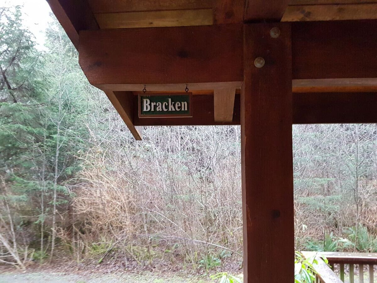 A wooden structure with a sign reading "Bracken."