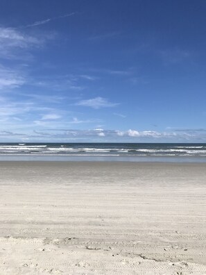 On the beach, sun-loungers, beach towels