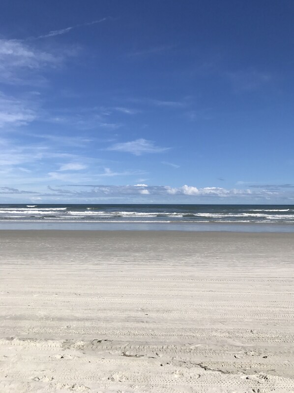 On the beach, sun-loungers, beach towels