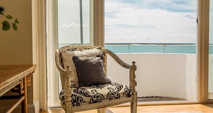 Spacious family house with panoramic sea views - short walk to the beach.