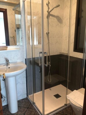 Shower, free toiletries, hair dryer, towels