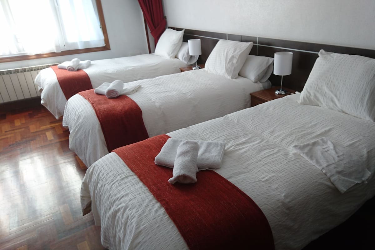 Quadruple Room, Shared Bathroom | Minibar, desk, blackout drapes, cribs (free)