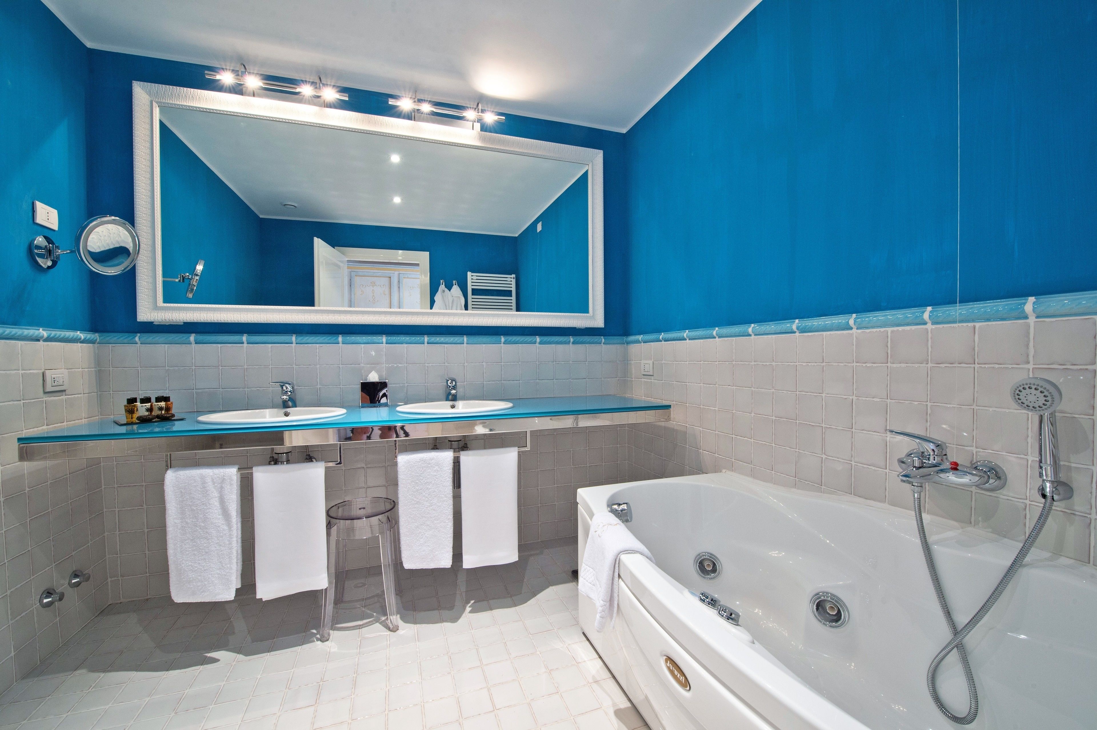 jetted bath, free toiletries, hair dryer, bathrobes