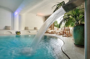 Indoor pool, outdoor pool, open 10:00 AM to 7:00 PM, pool umbrellas