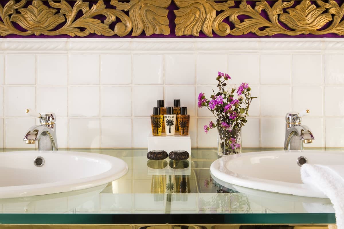 panoramic suite, 1 king bed with sofa bed, hot tub, sea view | bathroom sink