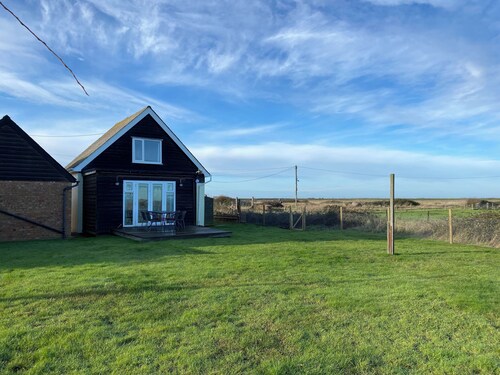 Cozy comfortable cottage by the sea and water, surrounded by fields and space