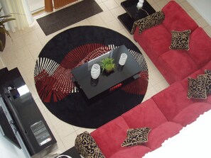 Flat-screen TV, DVD player, table football, ping pong