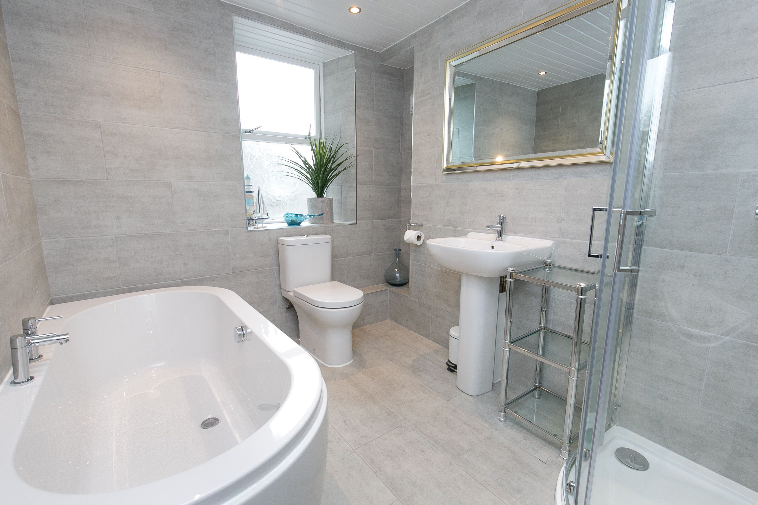 Combined shower/tub, hair dryer, towels, soap