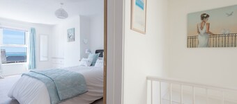 Stunning Beautiful Beamed Cottage right opposite the Beach along with Sea Views