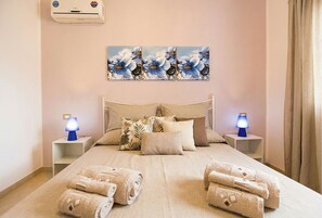 4 habitaciones, tabla de planchar con plancha y cuna de viaje 