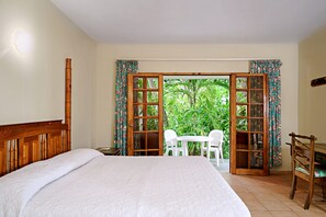 Lower Beach House Condo - Master bedroom with king bed