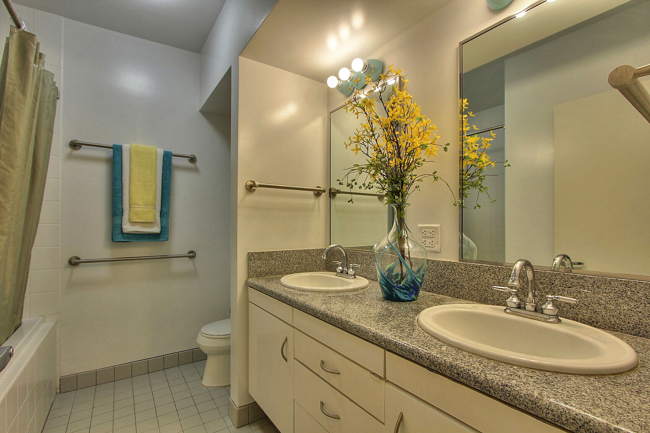 Combined shower/tub, hair dryer, towels, soap