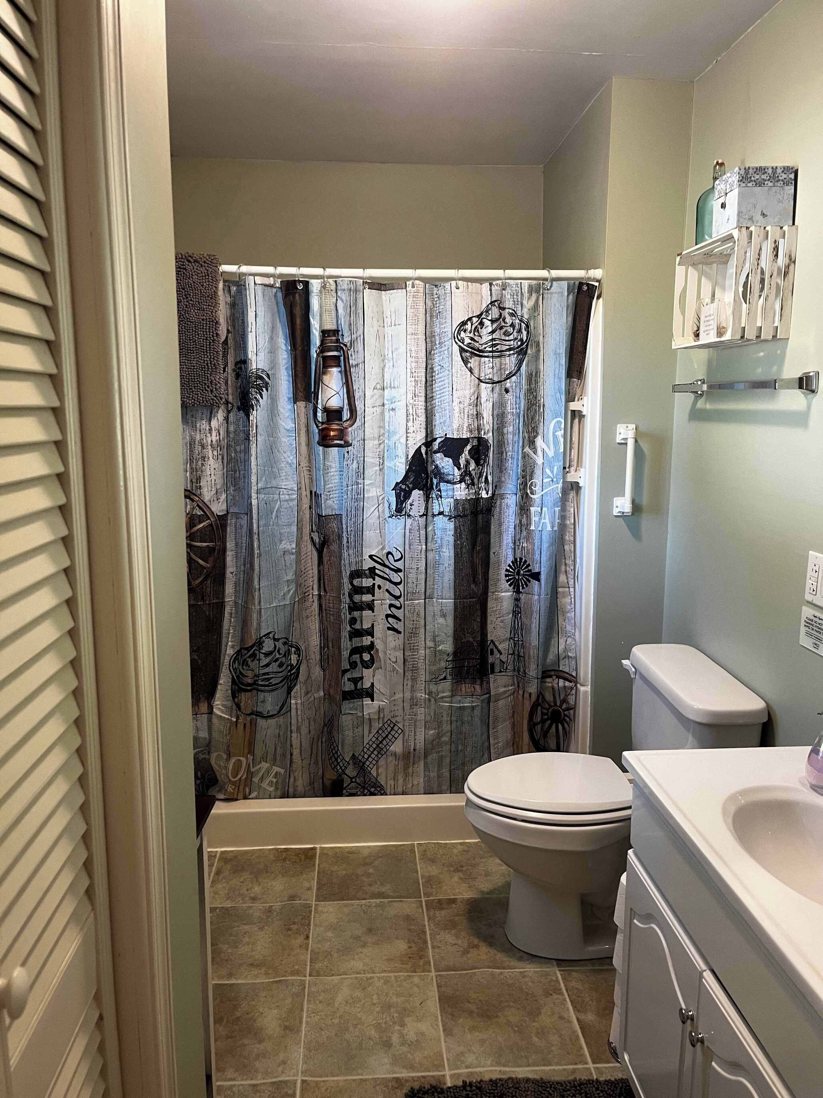 Shower, hair dryer, towels, shampoo