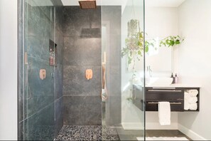 Combined shower/tub, hair dryer, towels, soap