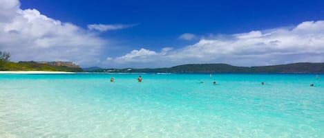 On the beach, sun-loungers, beach towels