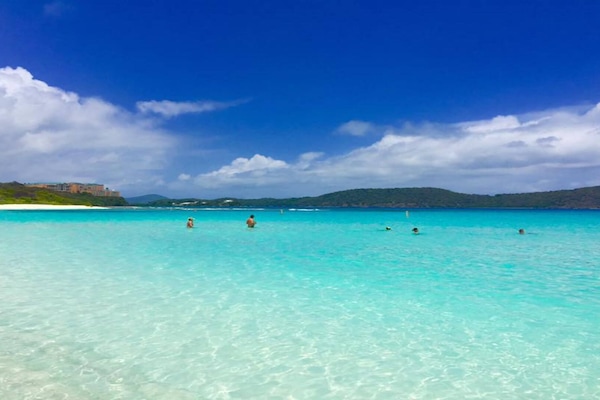 On the beach, sun-loungers, beach towels