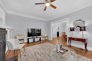 Smart TV, fireplace, books