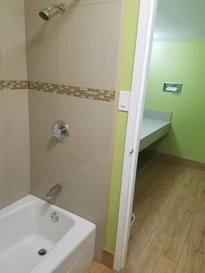 Standard Room, 2 Queen Beds | Bathroom | Combined shower/tub, rainfall showerhead, free toiletries, towels - Frontier Motel (Roswell)