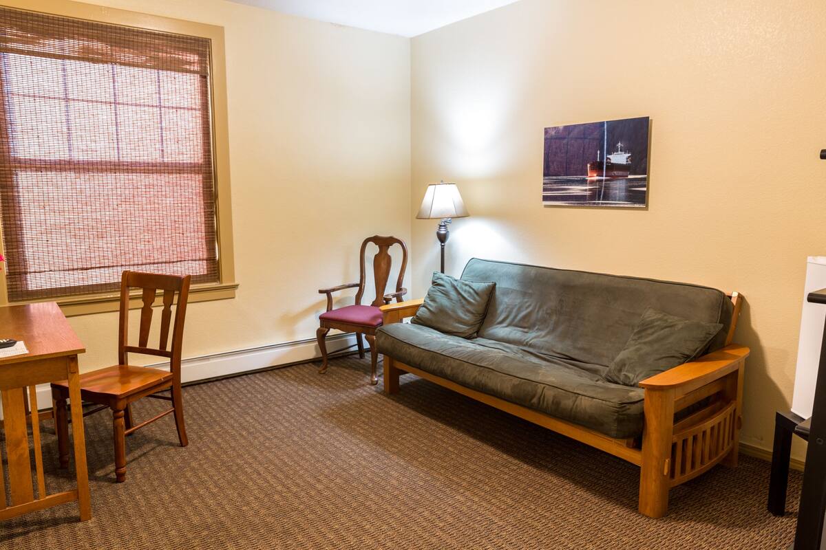 basic suite, 1 bedroom, refrigerator, river view | living room | flat-screen tv