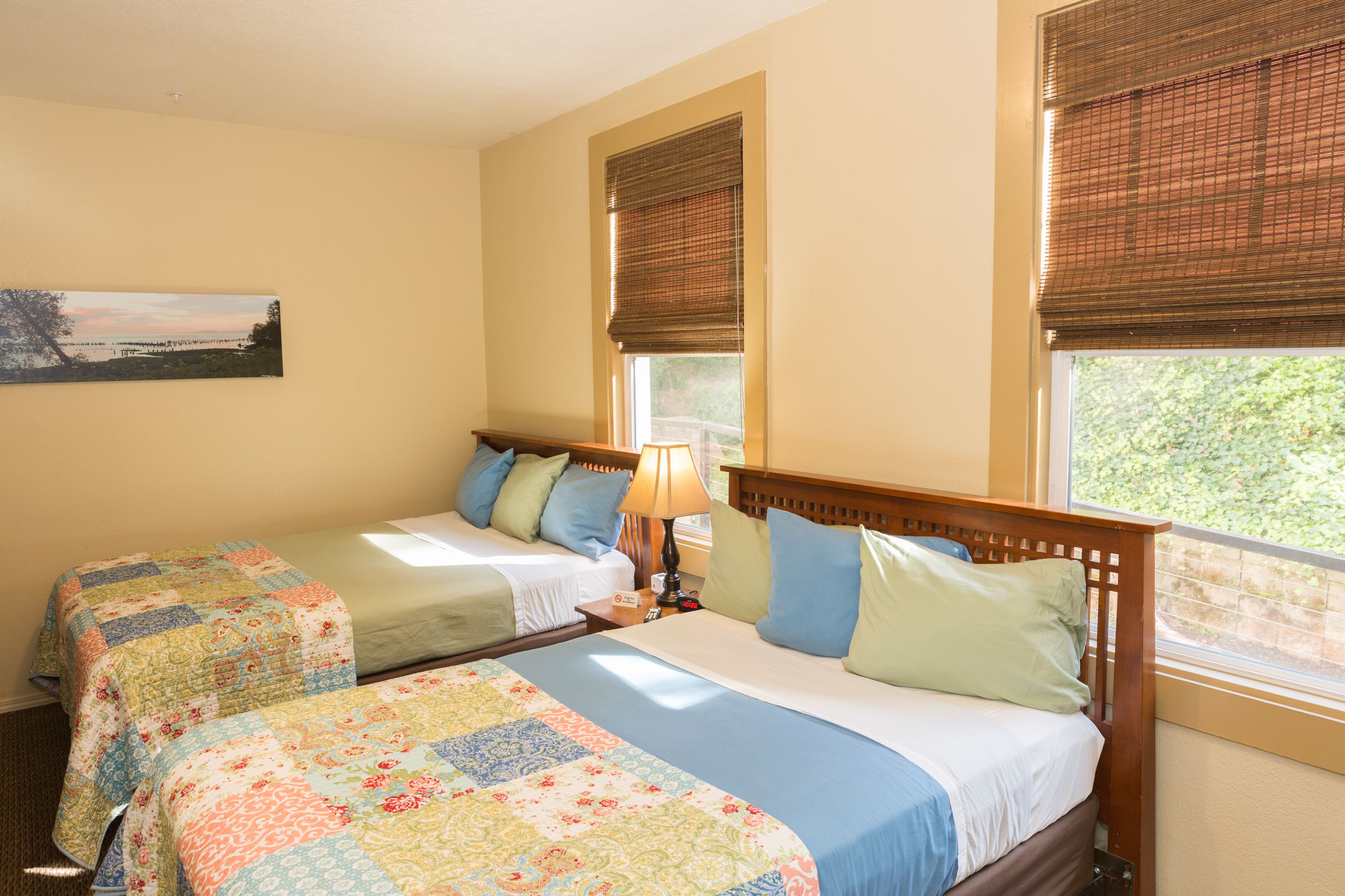 basic room, multiple beds, refrigerator, garden view | iron/ironing board, free wifi, bed sheets, wheelchair access