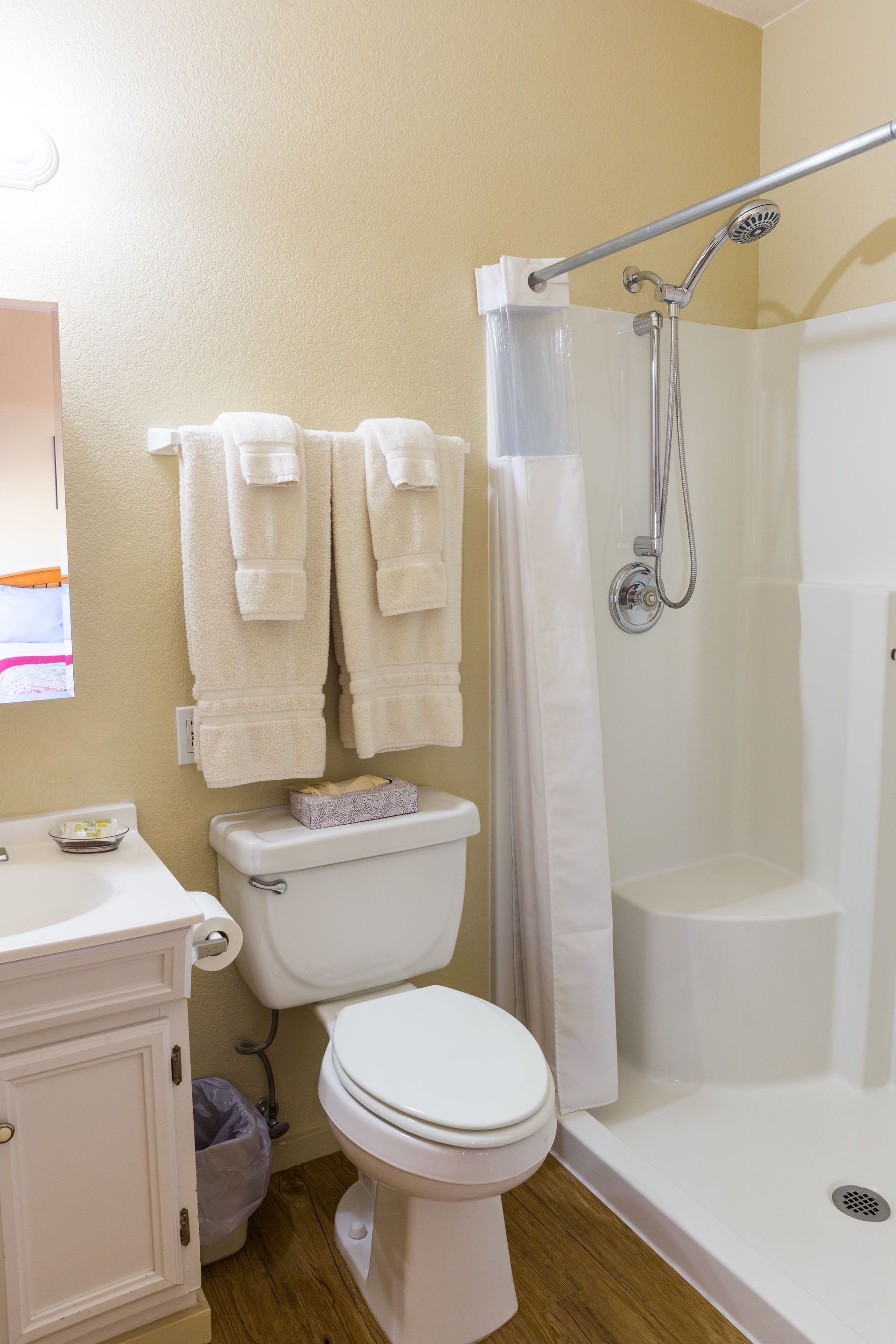 basic room, 1 queen bed, refrigerator, river view | bathroom | free toiletries, hair dryer, towels