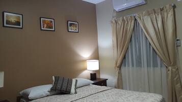Family Apartment, 2 Bedrooms | Premium bedding, down comforters, in-room safe, iron/ironing board