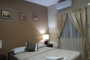 Family Apartment, 2 Bedrooms | Premium bedding, down comforters, in-room safe, iron/ironing board - El Suto Aparthotel (San Jose de Chiquitos)