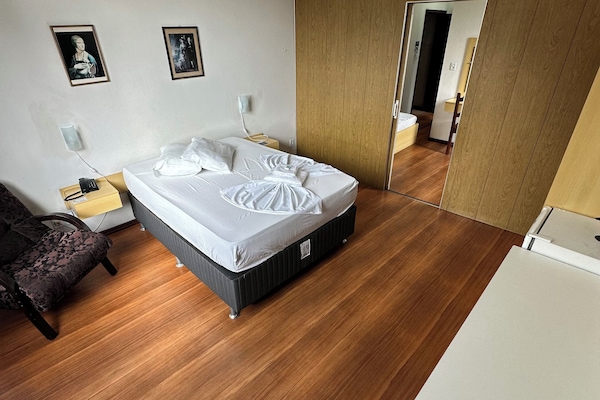 Superior Quadruple Room, Multiple Beds (Casal) | Minibar, in-room safe, desk, iron/ironing board