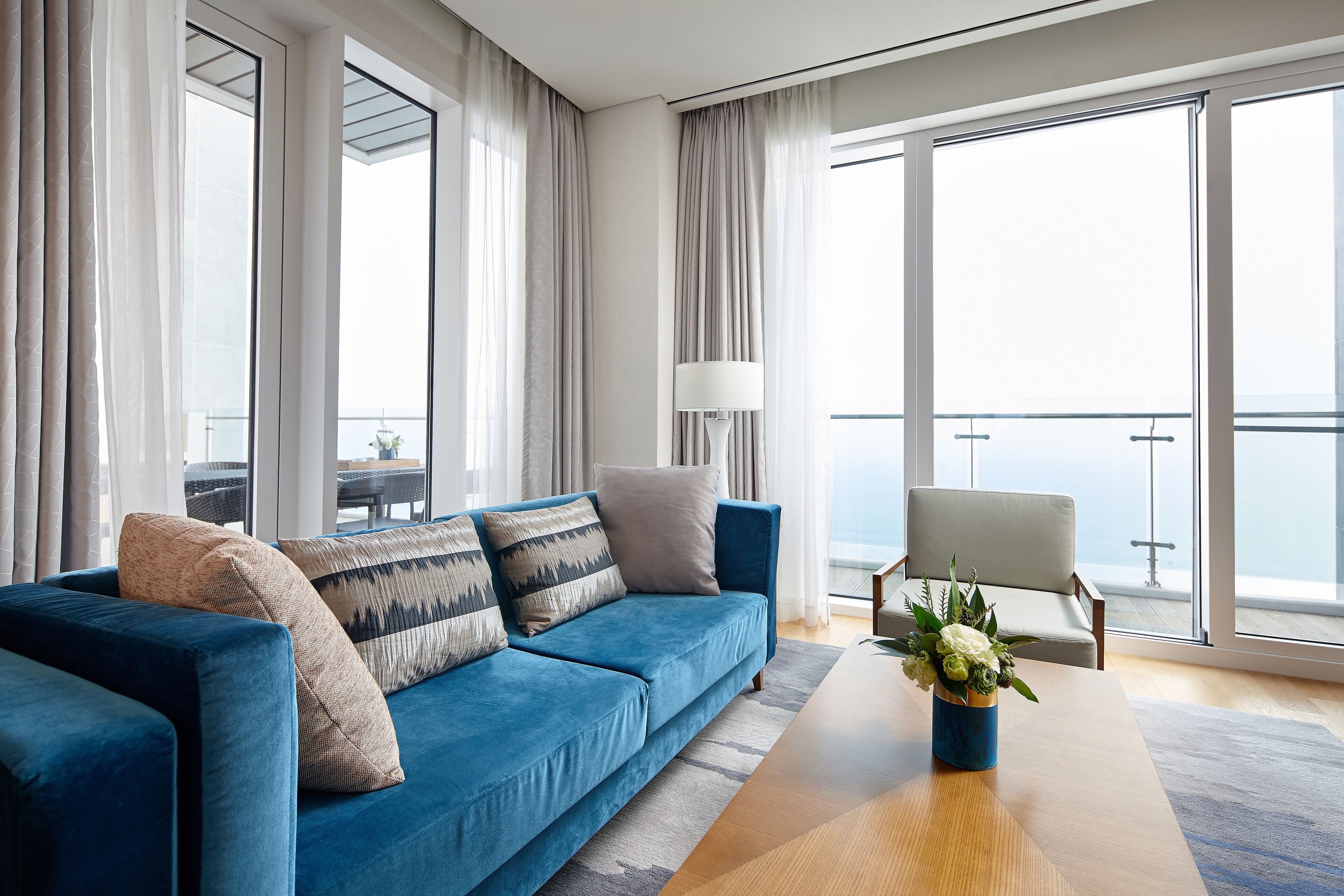 deluxe suite twin, ocean view | living room | 55-inch flat-screen tv with cable channels, tv