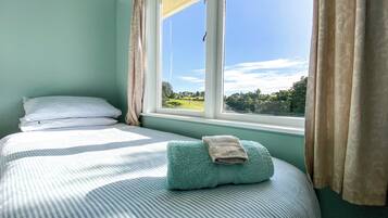 2 bedrooms, premium bedding, iron/ironing board, free WiFi