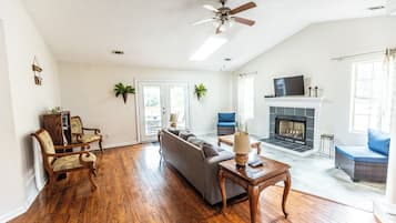 Smart TV, fireplace, books