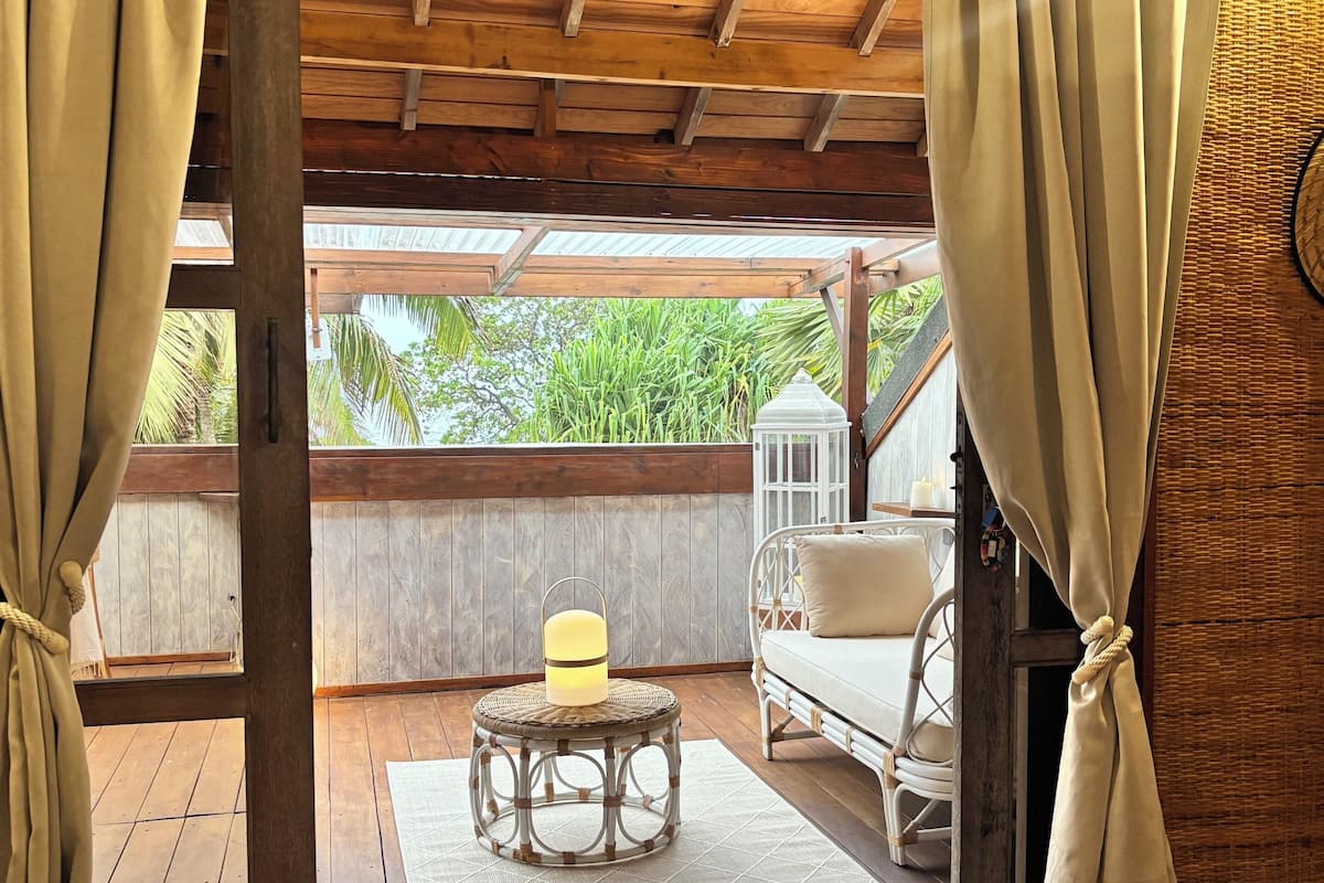 Luxury Bungalow, Partial Ocean View | Premium bedding, in-room safe, desk, laptop workspace
