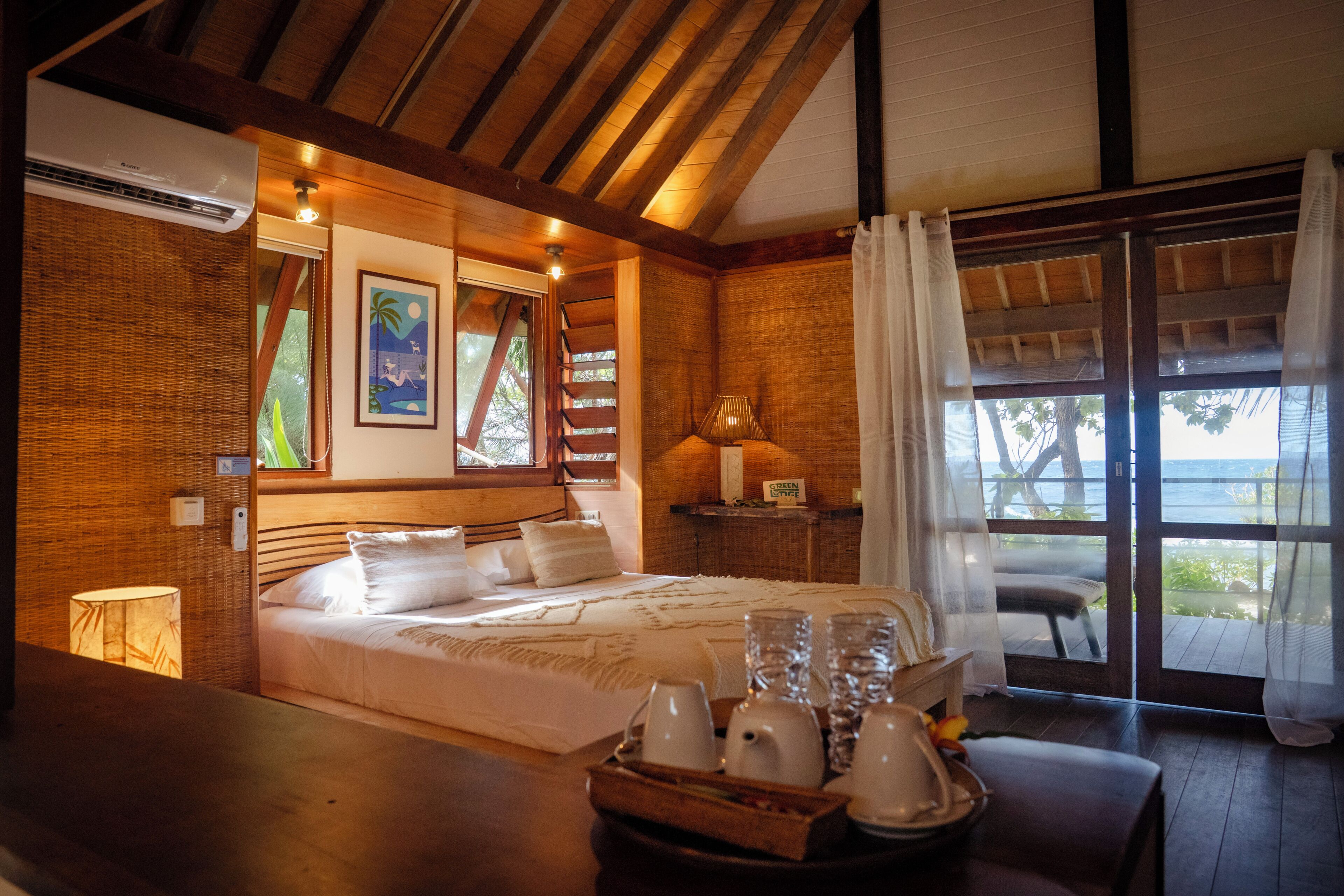 Superior bungalow, meerdere bedden, airconditioning, uitzicht op oceaan | Luxe beddengoed, een kluis op de kamer, individueel gedecoreerd